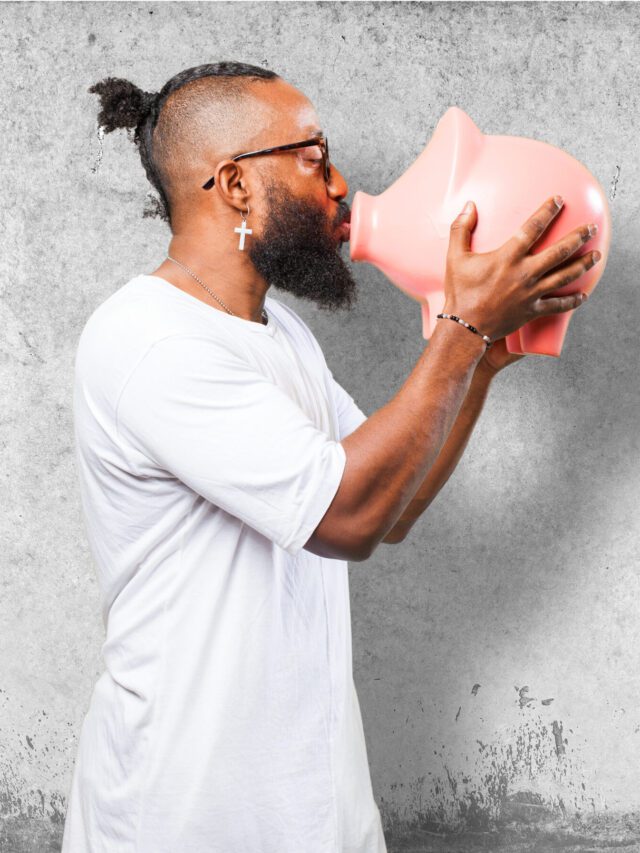 black man taking care of his piggy bank